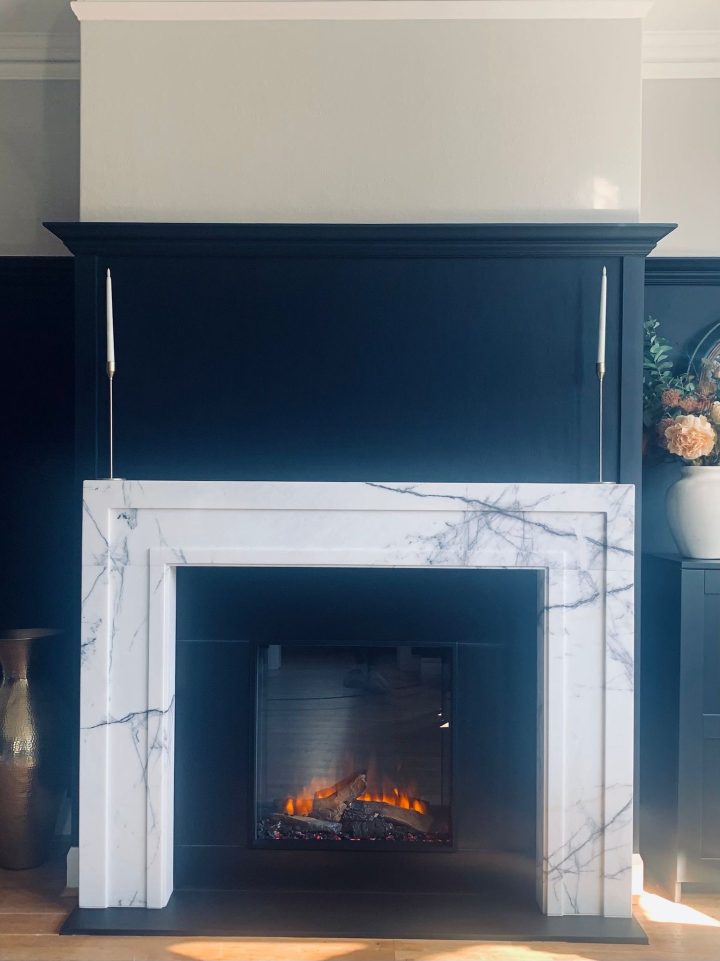 Elegant marble fireplace in a modern living room